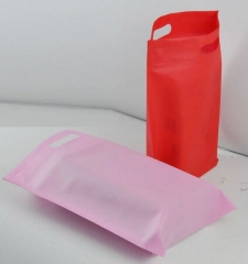 Nuevo diseño al por mayor barato reutilizable d-cut bolsas no tejidas biodegradable ecológico pp no ​​tejido d cut bolsa de asas hecho por Quanzhou Golden Nonwoven Co.,ltd